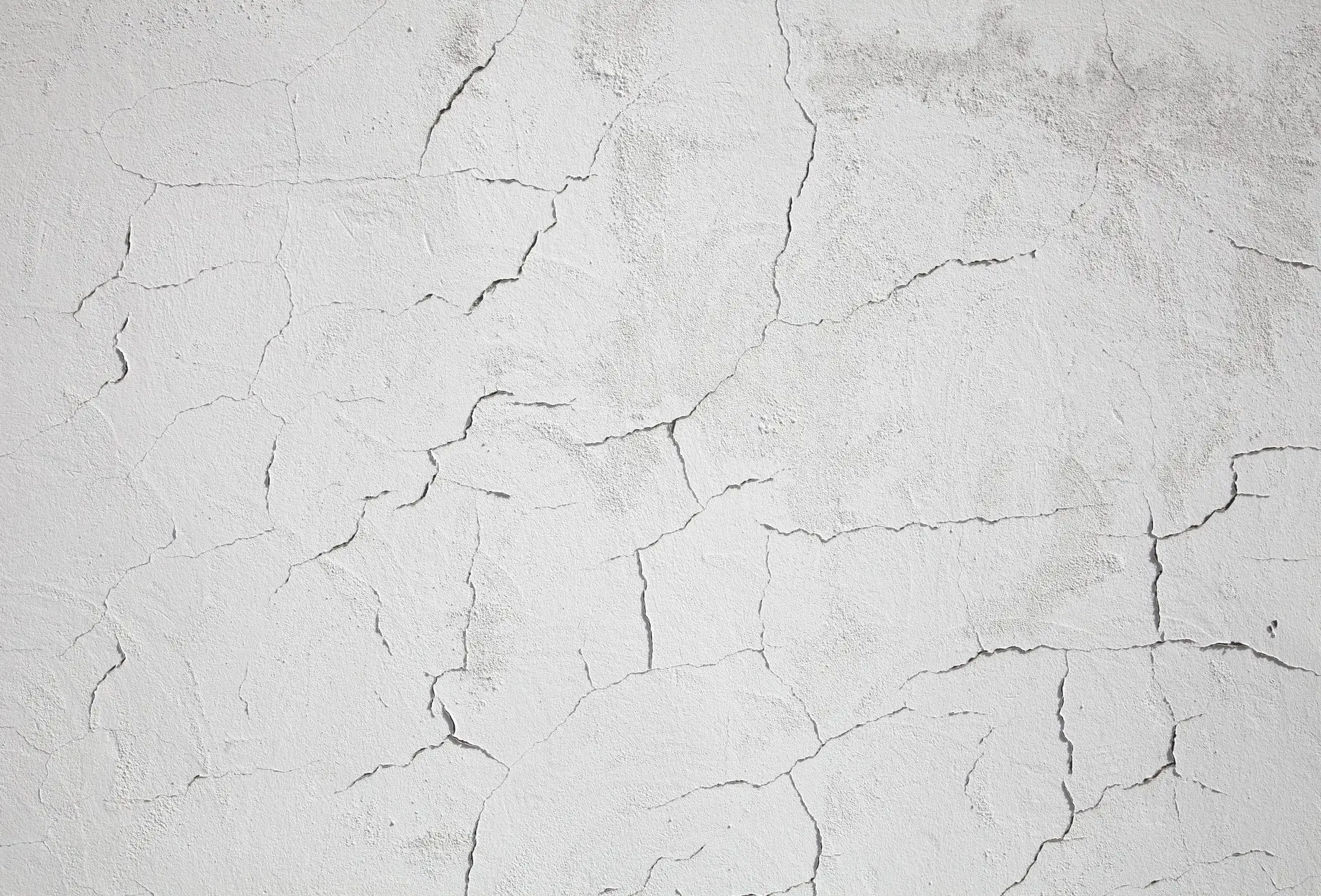 Putzrisse | Ein Sachverständiger kann genauer einschätzen, ob es sich um Schwindrisse, Setzrisse, Sackrisse, Kerbrisse oder Schrumpfrisse handelt (© LeitnerR / stock.adobe.com) Putzrisse | Ein Sachverständiger kann genauer einschätzen, ob es sich um Schwindrisse, Setzrisse, Sackrisse, Kerbrisse oder Schrumpfrisse handelt (© LeitnerR / stock.adobe.com)